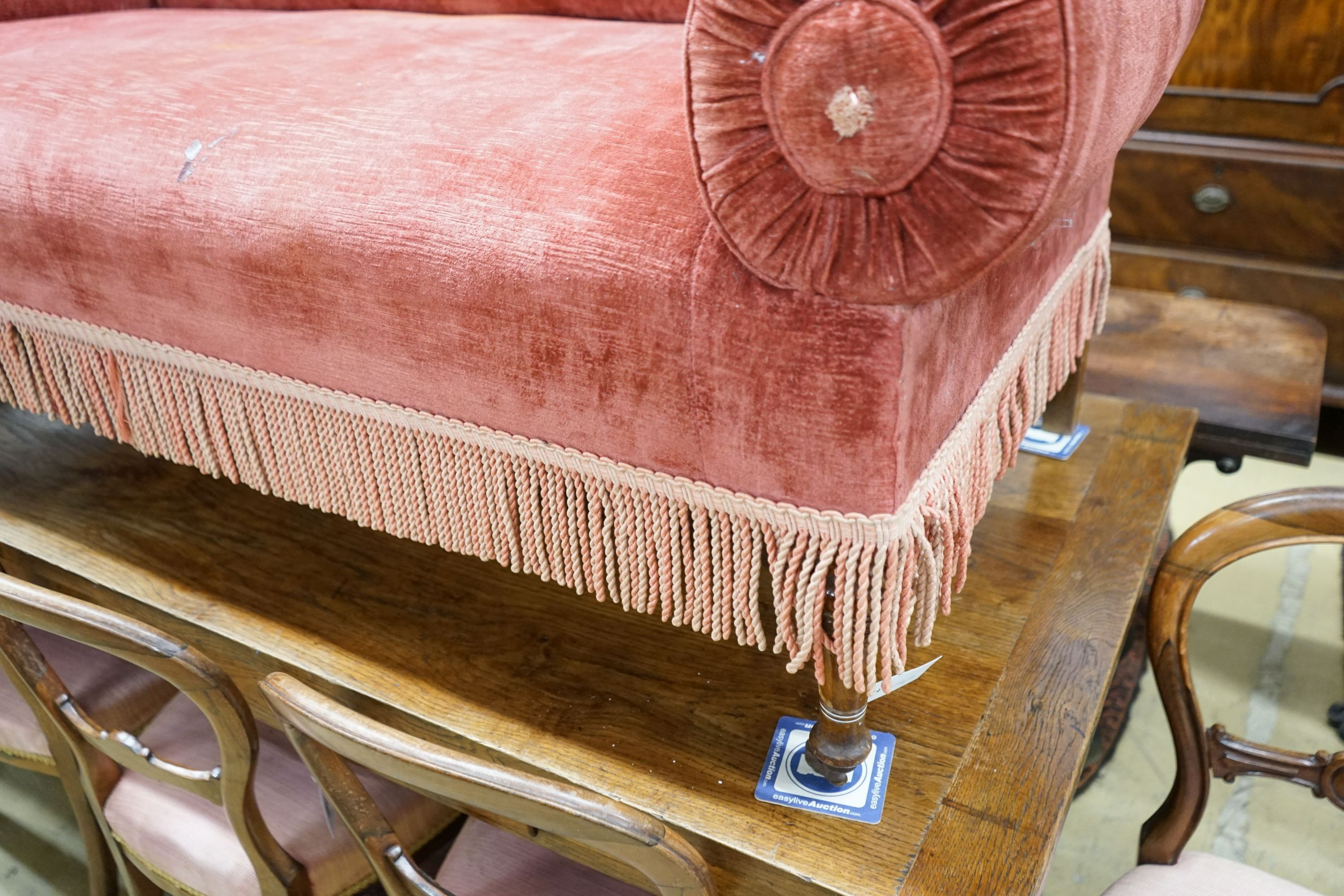 A 19th century Continental upholstered double drop arm settee, length 160cm, depth 74cm, height 84cm